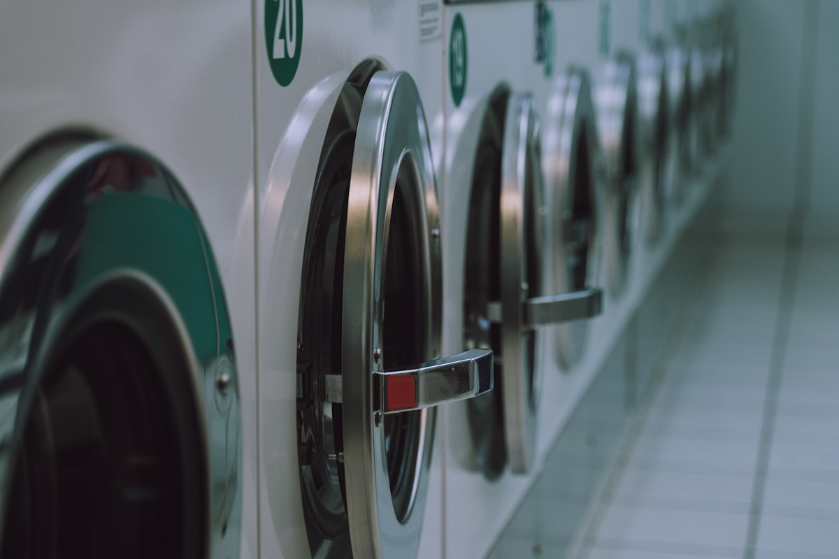 Modern professional washing machines at the AquaSpin laundromat